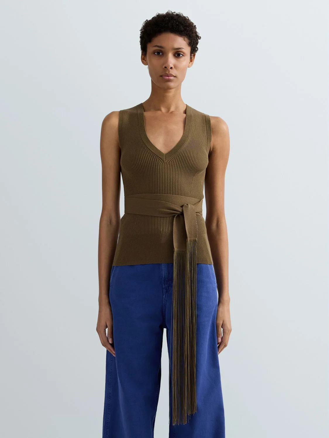 TOP IN MAGLIA A COSTINE CON CINTURA